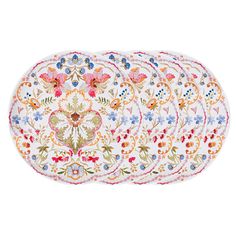 four white plates with colorful floral designs on them