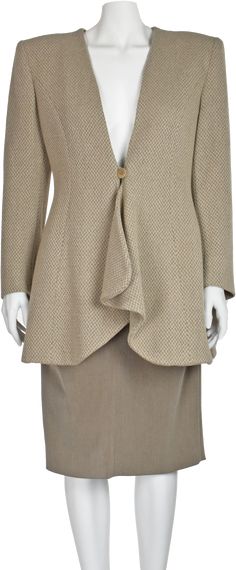 From Giorgio Armani's Black Label comes this striking two-piece ensemble comprising a tapue wool jacket with a waterfall detail below the waist, and an unusual pencil skirt with ruching on the sides. The jacket has padded shoulders and closes with a single button. The skirt has a back zipper. The jacket is a wool, viscose and nylon blend, and the soft skirt is a polyester and rayon blend. These are luxurious vintage pieces that date from the 1980s. The jacket is labeled Italian size 44, and the Black Wool Coat Women, Armani Shop, Armani Vintage, Black Suit Dress, Soft Skirt, Skirt And Jacket, Womens Suits, Armani Black, Plaid Coat