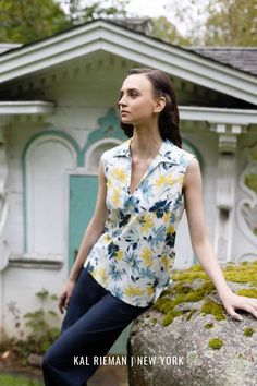 Our Collared V Neck top is the perfect go to, to make your summer wardrobe a breeze. Made in our best seasonal Floral Print, this blouse has a back pleat detail for ease of movement, and pairs well with any slim bottom. Fitting Pants