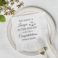 a napkin with the words we have a law in the house congratulationss on it