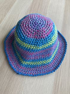 A crochet bucket hat pattern. Crochet Hats For Beginners, Cute Crochet Hats, Free Crochet Bucket Hat, Free Hat Patterns, Crochet Bucket Hat Free Pattern, Bucket Hat Pattern Free, Colorful Bucket Hat, Crochet Pouf Pattern, Crochet Slouchy Beanie Pattern