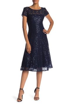 Sparkle in this lovely sequin embellished lace dress with a fit-and-flare silhouette for elegant style. 44 1/2" length (size 8) Bateau neck Short sleeves Partially lined 60% nylon, 40% rayon Spot clean Imported Sequin Lace Dress, Hamster House, Coctail Dresses, Mother Of Groom Dresses, Mob Dresses, Midi Cocktail Dress, Midi Dress Party, Short Dresses Casual, Tea Length Dresses