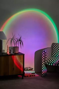 a living room with a rainbow colored wall