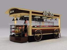 the food cart is designed to look like it has wheels on each side and an awning