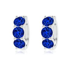 Score major style points with these chic hoop earrings. They are embellished with brilliant round blue sapphires, secured in prong settings. These three stone earrings are designed in platinum. Stone Hoop Earrings, Blue Sapphire Earrings, Sapphire Earrings, Round Earrings, Three Stone, Lab Grown, Blue Sapphire, Platinum, Sapphire