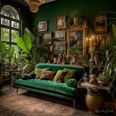 an instagram photo of a living room with green furniture and plants on the wall