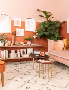 a room filled with lots of potted plants next to a wall mounted planter