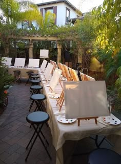 many chairs and tables are lined up outside