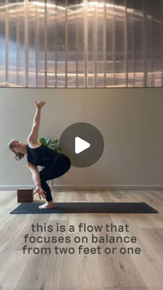 a woman is doing yoga on a mat with the words this is a flow that focuses on balance from two feet or one