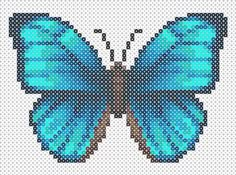 a blue butterfly with dots on it's wings is shown in the shape of a cross stitch pattern