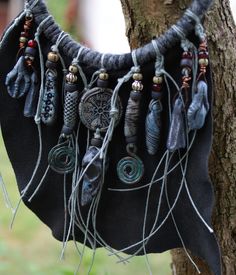 Organic tribal, pagan necklace with a lot of shamanic amulet porcelain beads, bird skull, Helm of Awe (made by me) - based on a black leather. Total length of this necklace is c/a 50 cm. Found Object Jewelry Native American, Shaman Jewelry Pendants, Bone Crafts Necklaces, Shaman Necklace Bones, Witchy Beaded Jewelry, Shaman Clothing, Shaman Necklace, Florida Jewelry, Organic Necklace