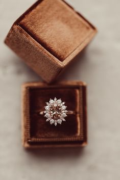 an engagement ring in a velvet box