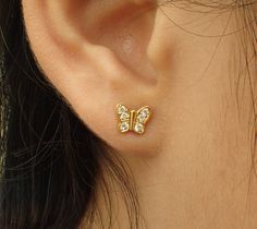 Butterfly Earrings, Gorgeous Pair of Butterfly, 14k Solid Gold with White Sapphires, Tiny Butterfly Earrings, Stud Post Earrings About Features- * Made to order * Materials: Solid Gold * Gold karat: 14K * Gold color: Yellow Gold, White Gold, Rose Gold * Gemstones: 12 Pcs White Sapphires * Stone size: 8 Pcs 1.1 mm and 4 Pcs 1.3mm * Total CTW: 0.14 * Gemstones Grade: AAA Natural White Sapphires * Location: Earlobe * Dimension: 6.95 x 5.50 mm * Style: Butterfly Earrings * Ready to Ship in 1-2 Weeks Side Tops Earrings Gold, Gold Diamond Earrings With Ear Wire For Gift, Hypoallergenic Yellow Gold Diamond Earrings As Gift, Ear Tops Gold Indian, Simple Gold Earrings For Daily Use, Gold Tops Earrings, Gold Earrings Designs For Daily Use, Plain Bangles, Earrings For Kids