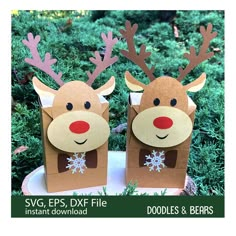 two brown paper bags with reindeer faces on them