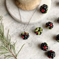 Growing up, hanging out with my Grandpa consisted of either listening to the radio with him OR going blackberry picking in his woods. I remember the bushes were so thorny but the skin on his hands was so weathered he just went right for it like he didn't even notice! 🖤 This is a handblown glass blackberry necklace. The berry is anatomically correct in size and detail. The berries are black with a small amount of red, and each bead is 12-15 mm in length. Pictured is a stainless steel chain, but Blackberry Fruit, Blackberry Picking, Fruit Necklace, Flowers In Jars, Black Velvet Choker, Fruit Jewelry, Velvet Choker, Stainless Steel Chain, Hand Blown Glass