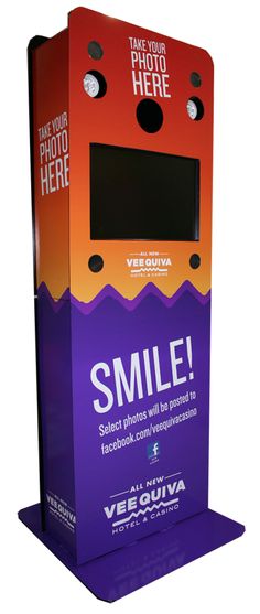 a purple and red box with the words smile on it's front side, sitting in front of a white background