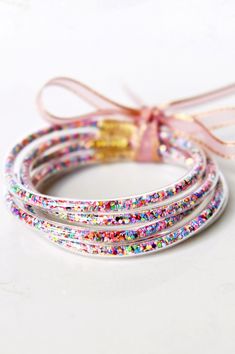 Colorful Confetti Sequin Tube Bangles. One size fits most. Stack of 5. Jelly Bracelets, Talk To The Hand, Tube Bracelet, Colorful Confetti, Bracelet Stacks, Horse Earrings, Bangle Bracelet Set, Stacked Bangles, Bangle Set