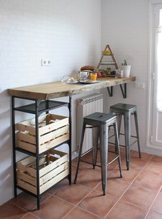 the kitchen is clean and ready to be used as a breakfast bar or dining room