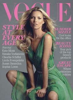 a woman sitting on top of a magazine cover wearing a green dress and high heels