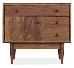 the sideboard is made out of wood and has three drawers