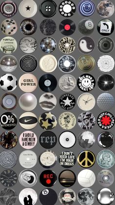 many different types of buttons on a gray background