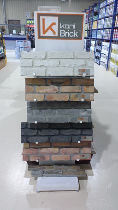 a stack of bricks sitting on top of a store floor