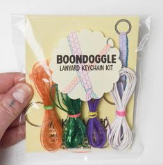 a package of assorted keychain kits in the shape of booooogle