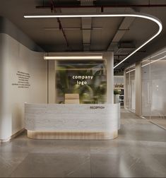 an office lobby with a white reception desk