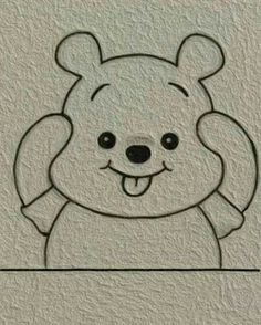 a drawing of a teddy bear on a wall