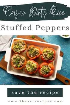 some stuffed peppers on a tray with the title saying cajun dirty rice stuffed peppers save the recipe