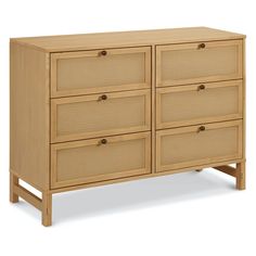 a large wooden dresser with four drawers