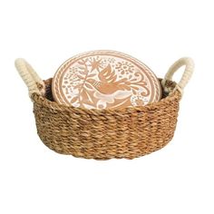 a basket with two plates in it on a white background