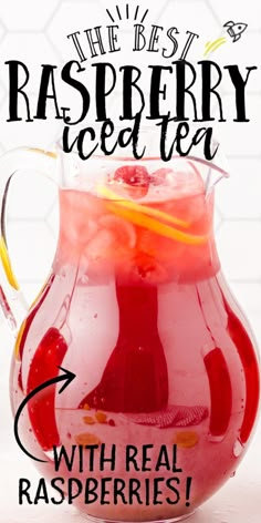 the best raspberry iced tea with real raspberries in a glass pitcher