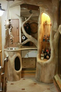 the bathroom is made out of tree trunks