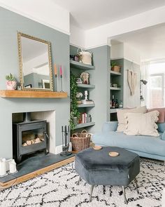 Save this pin for stunning blue and gray decor inspiration! Elevate your home with these chic and modern living room ideas. #homedecor #livingroomdesign #interiordesigninspo Teal Furniture Living Room, Teal Lounge Ideas, Light Teal Living Room, Teal And Cream Living Room, Small Victorian Terrace Interior, Teal Lounge, Teal Sofa Living Room, 1930s Living Room, Teal Living Room