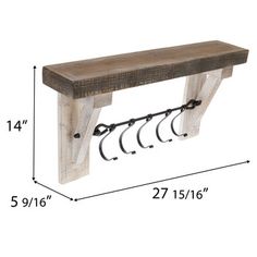 a wooden bench with four hooks on it