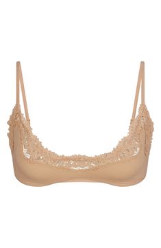 A tracery of the prettiest lace frosts the topline of this barely there scoop bralette that offers a second-skin fit. Adjustable straps Partially lined 76% polyamide, 24% elastane Machine wash, tumble dry Imported Baby Bats, Second Skin, Kim Kardashian, Bralette, Bat, Scoop Neck, Adjustable Straps, Nordstrom, Bts