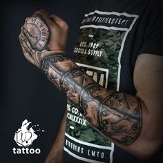 a man's arm covered in tattoos with an old timey clock on it