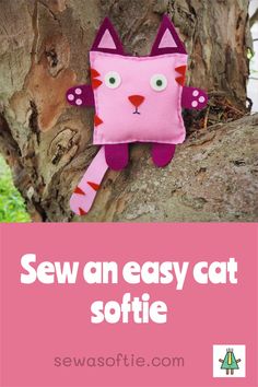 a pink cat stuffed animal sitting in the middle of a tree with text overlay saying sew an easy cat softie