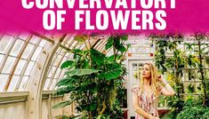 a woman standing in front of a greenhouse filled with lots of green plants and flowers