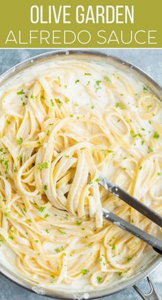 Olive Garden Alfredo sauce mixed in linguine with a pair of tongs tossing it Olive Garden Chicken Alfredo Recipe, Pasta Alfredo Receta, Olive Garden Alfredo Sauce Recipe, Olive Garden Alfredo, The Cozy Cook, Olive Garden Alfredo Sauce, Alfredo Sauce Recipe Easy, Cozy Cook, Alfredo Sauce Recipe Homemade