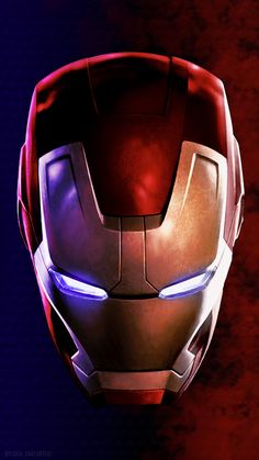 an iron man helmet with glowing eyes and red, purple, and blue lighting on it