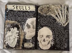 an open book with skulls and bones on it