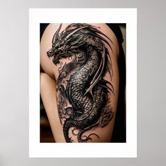 a woman's thigh with a dragon tattoo on the side and an arm behind her