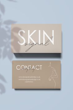 two business cards with the words skin equal and contact