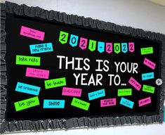 this is your year to bulletin board with sticky notes on the blackboard that says, 2012 - 2012