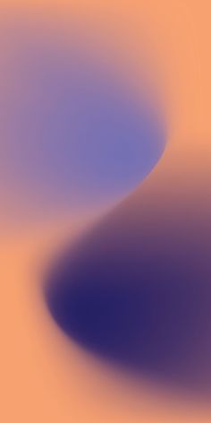 a blurry image of an orange and blue background with some light purple colors in the middle