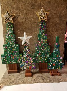 two christmas trees made out of lego blocks