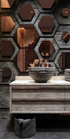 a modern bathroom with hexagonal mirrors on the wall and a sink in front of it