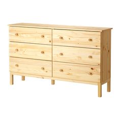 a large wooden dresser with four drawers